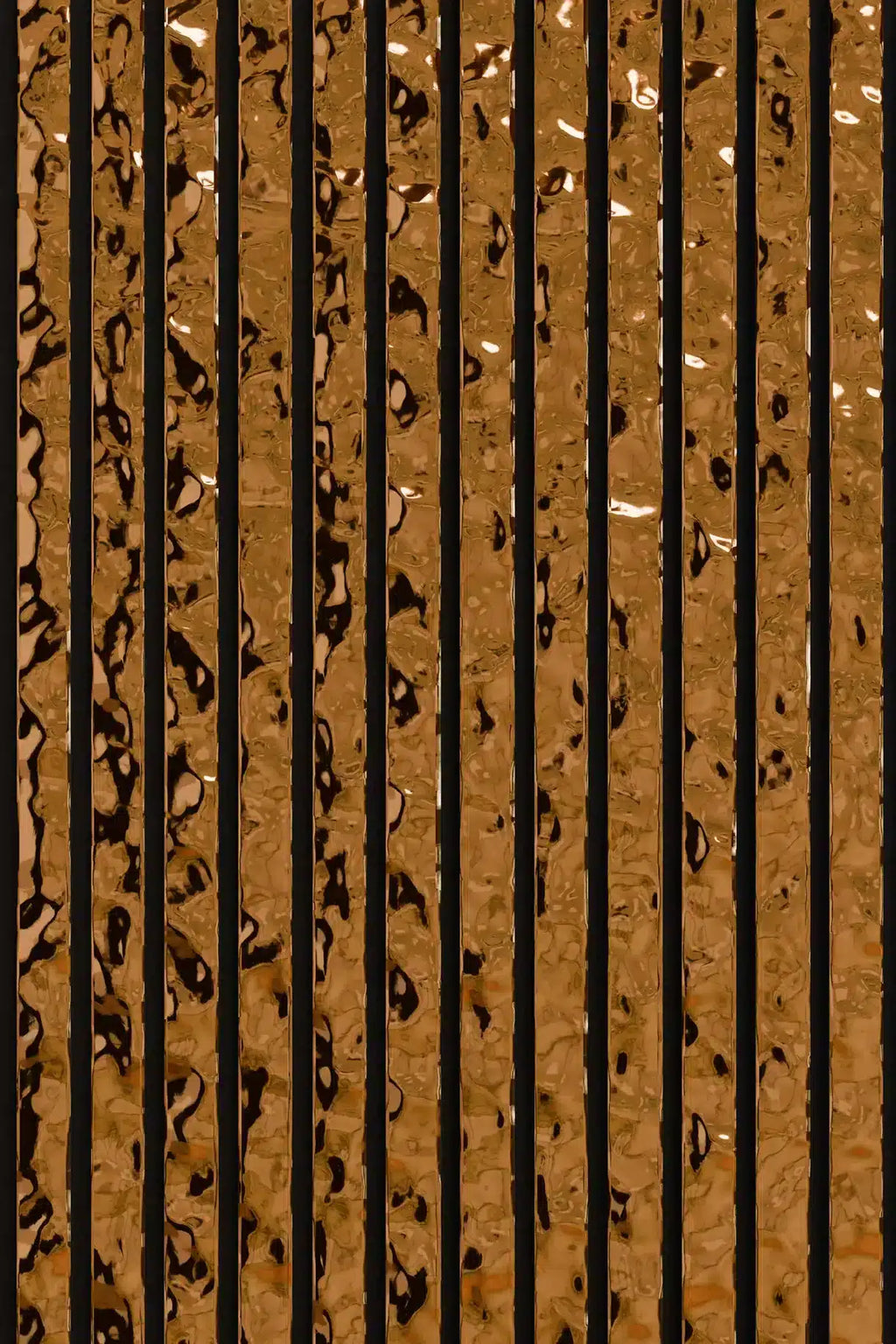 Panneau acoustique en métal Mirror Polished Lava Tea, vue rapprochée de la surface